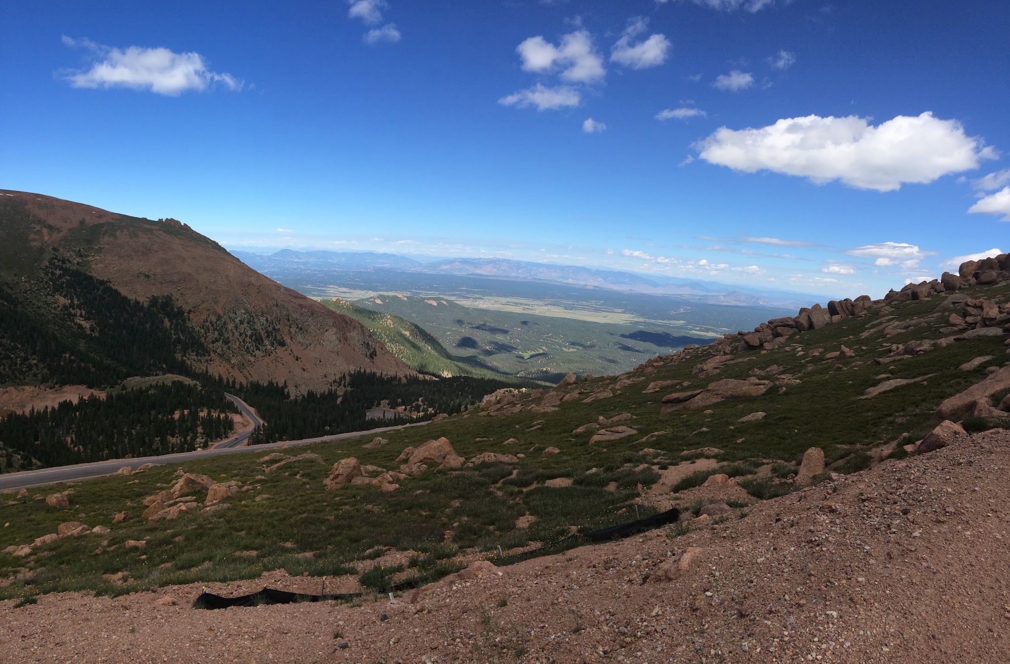 Looking down at plains from hairpins on Pikes Peak