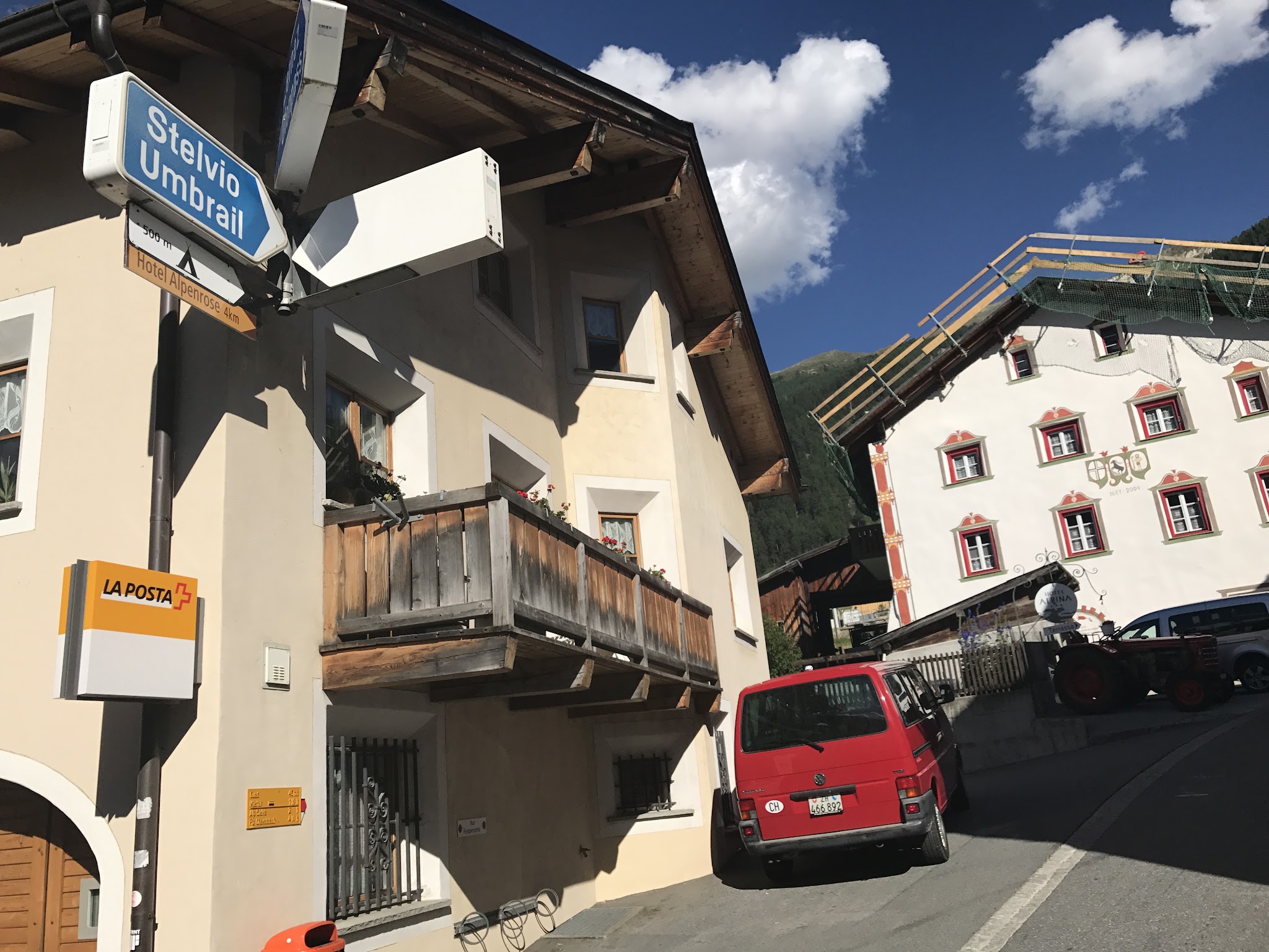 Cycling Umbrail Pass - Stelvio and Umbrail Pass sign, village, Santa Maria Val Mustair