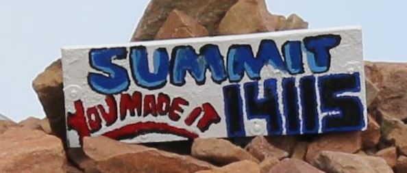 Pike's Peak - hand painted sign at summit of climb