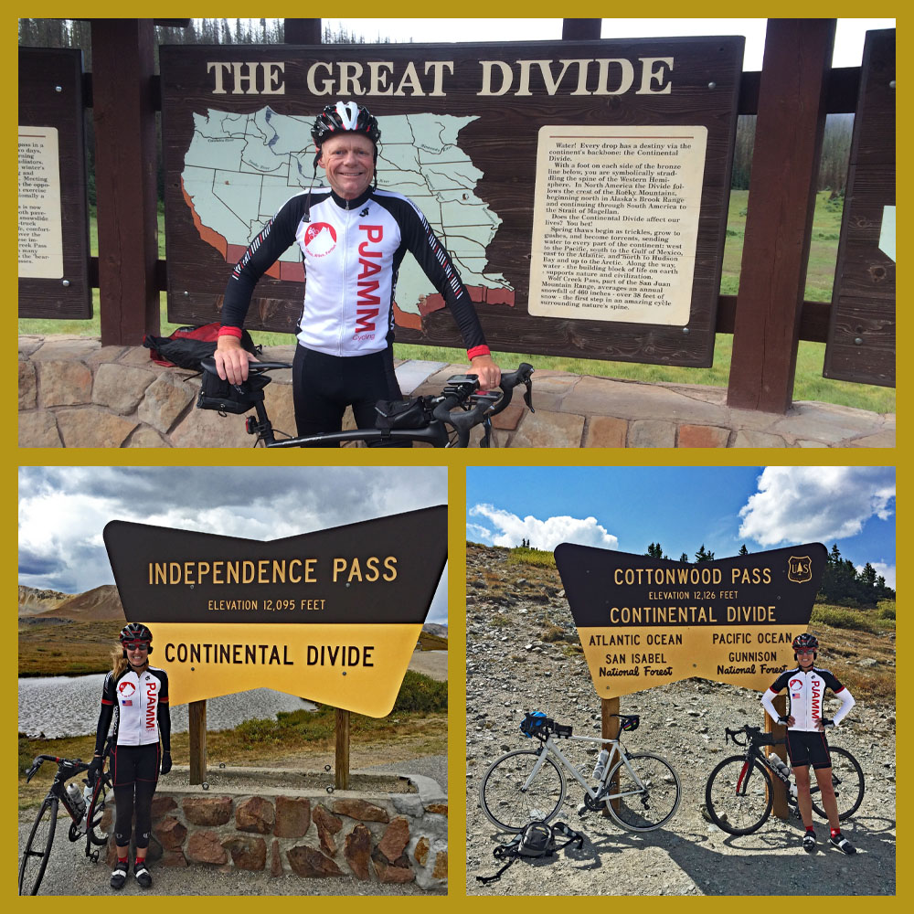 Cycling Independence Pass from Aspen, Colorado - John Johnson and Stacy Topping, wearing PJAMM Cycling jerseys standing with bike in front of signs for The Great Continental Divide, Independence Pass