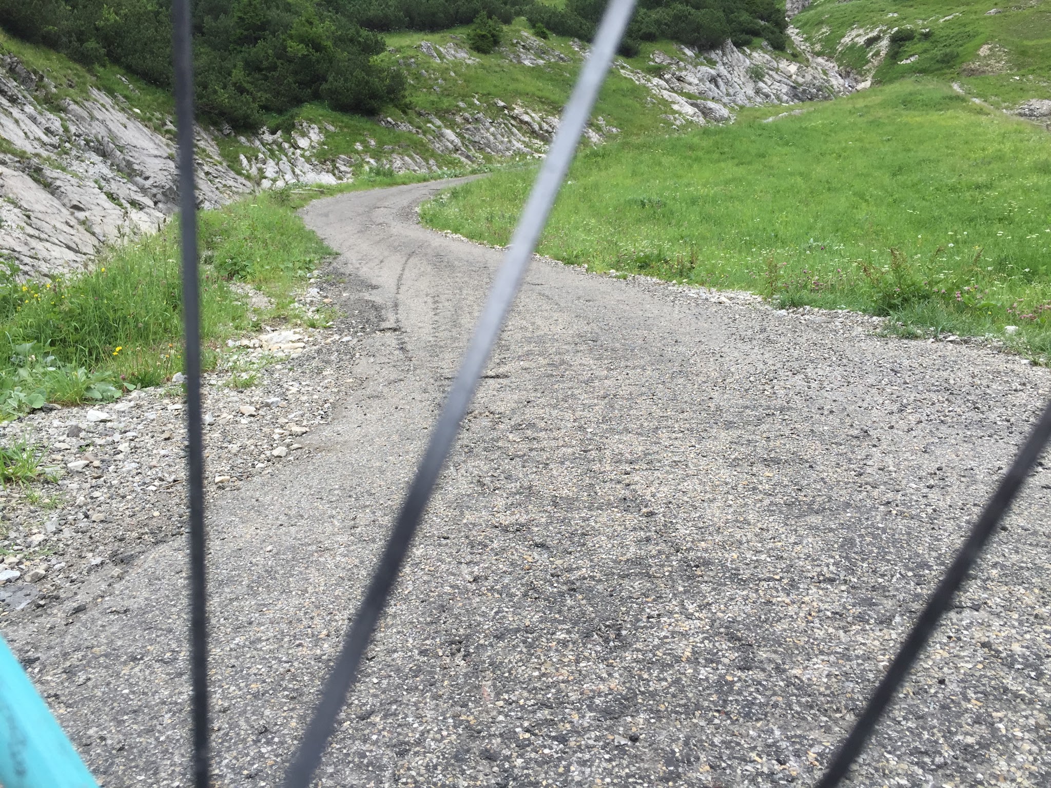Cycling Nebelhorn  - steep roadway through wheel spokes