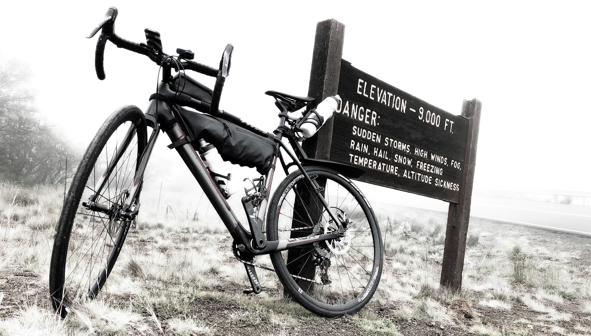 Top 10 World Bike Climbs - Mauna Kea - visitor center sign - altitude sickness, danger