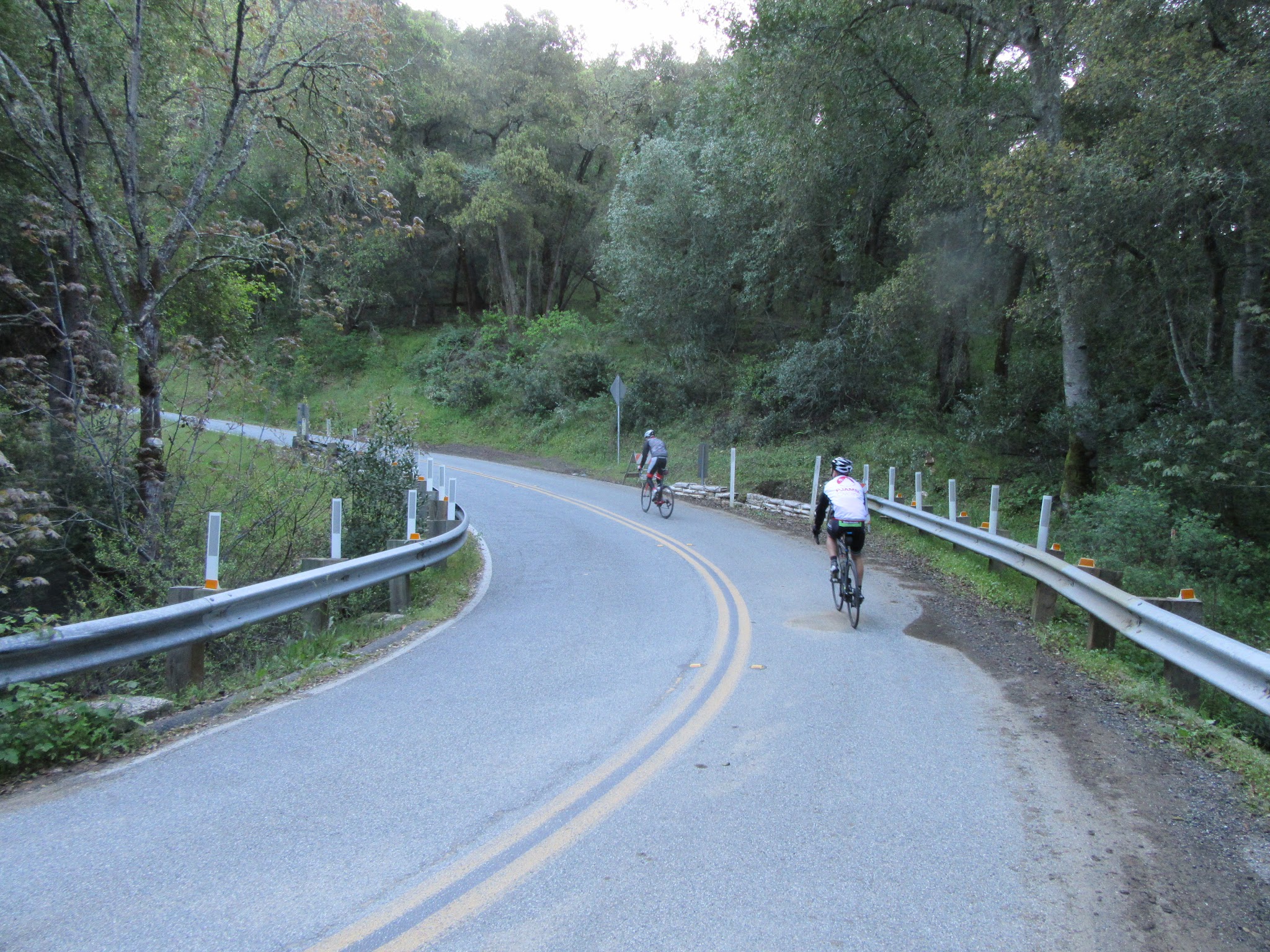 Cyclists on Hicks Road on way to Mt Umunhum by northern route