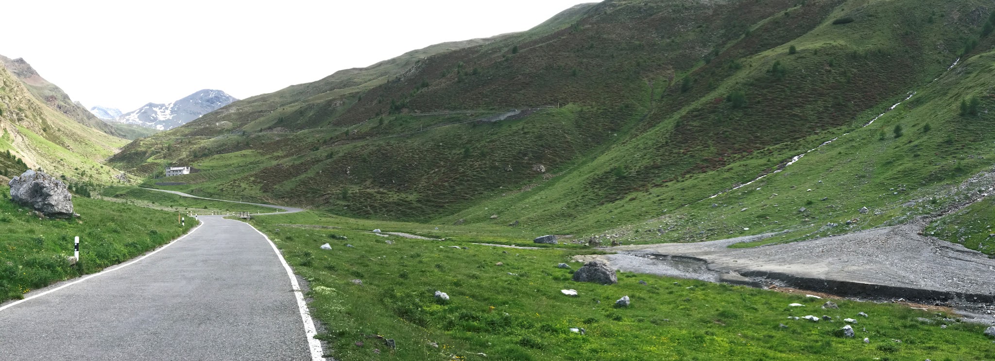 Cycling Umbrail Pass - road between hillsides