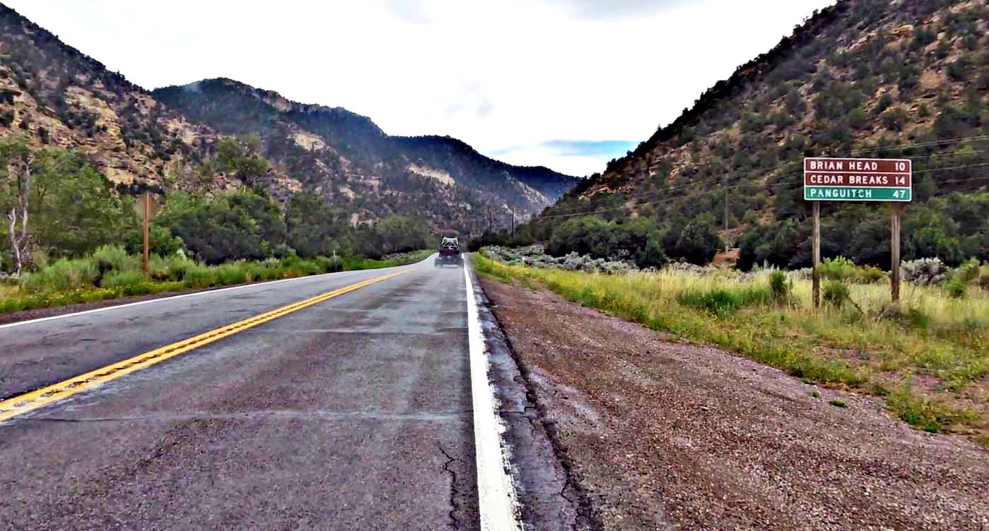 Climbing Hwy 143 by bike - start of climb - road and sign