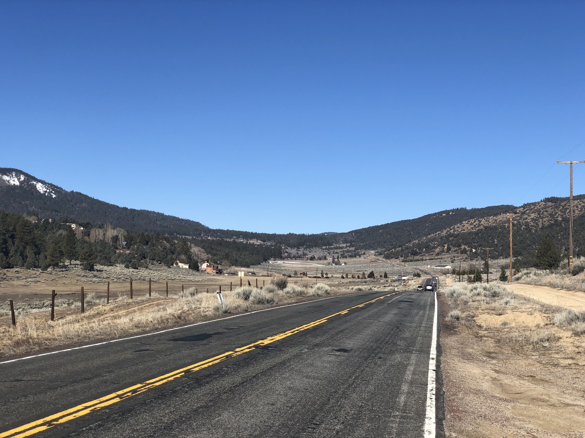 Bike climb Mt. Pinos - Cuddy Road, mountains behind