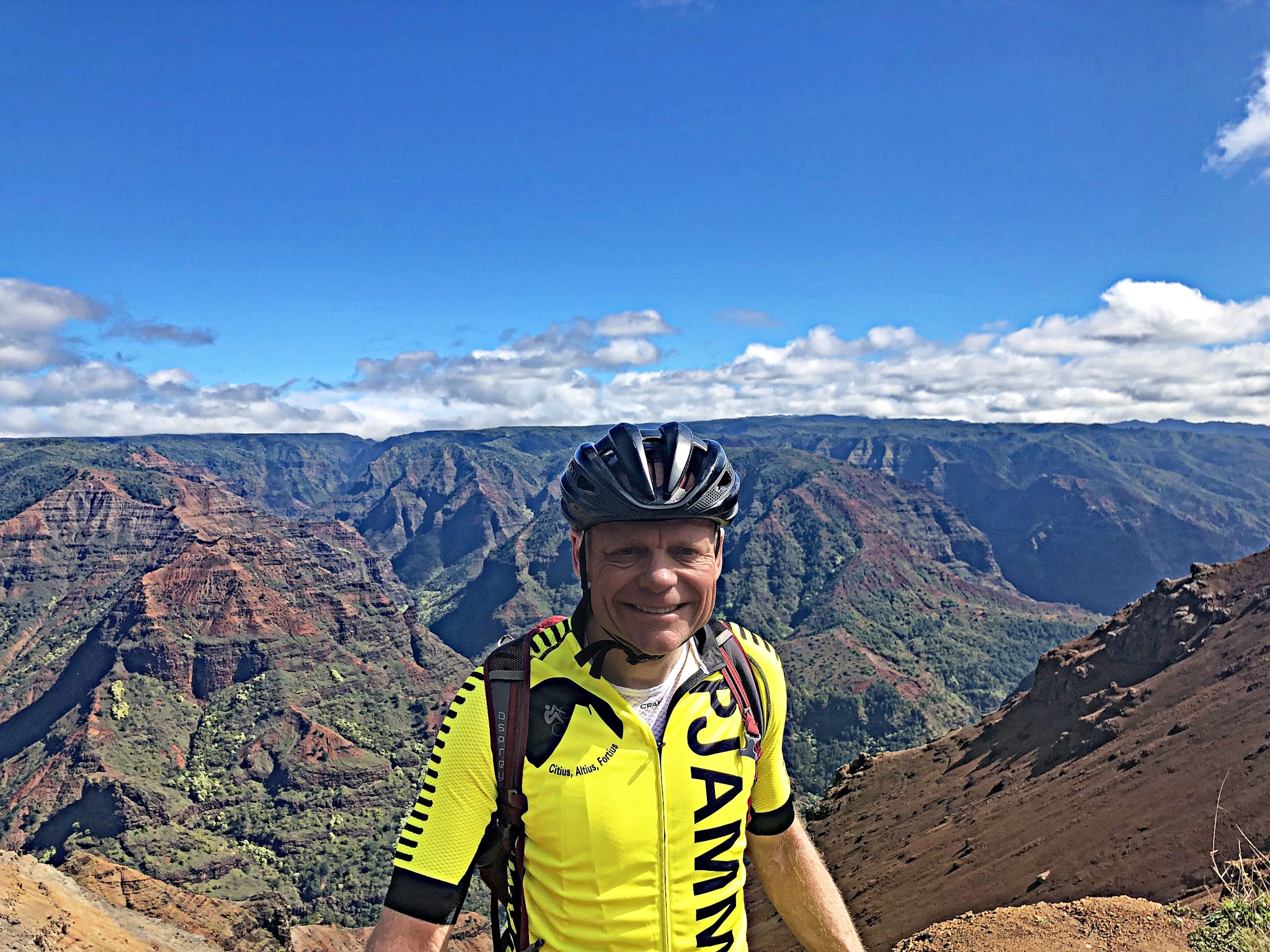 PJAMM Cyclist John Johnson smiles at Waimea Canyon Lookout
