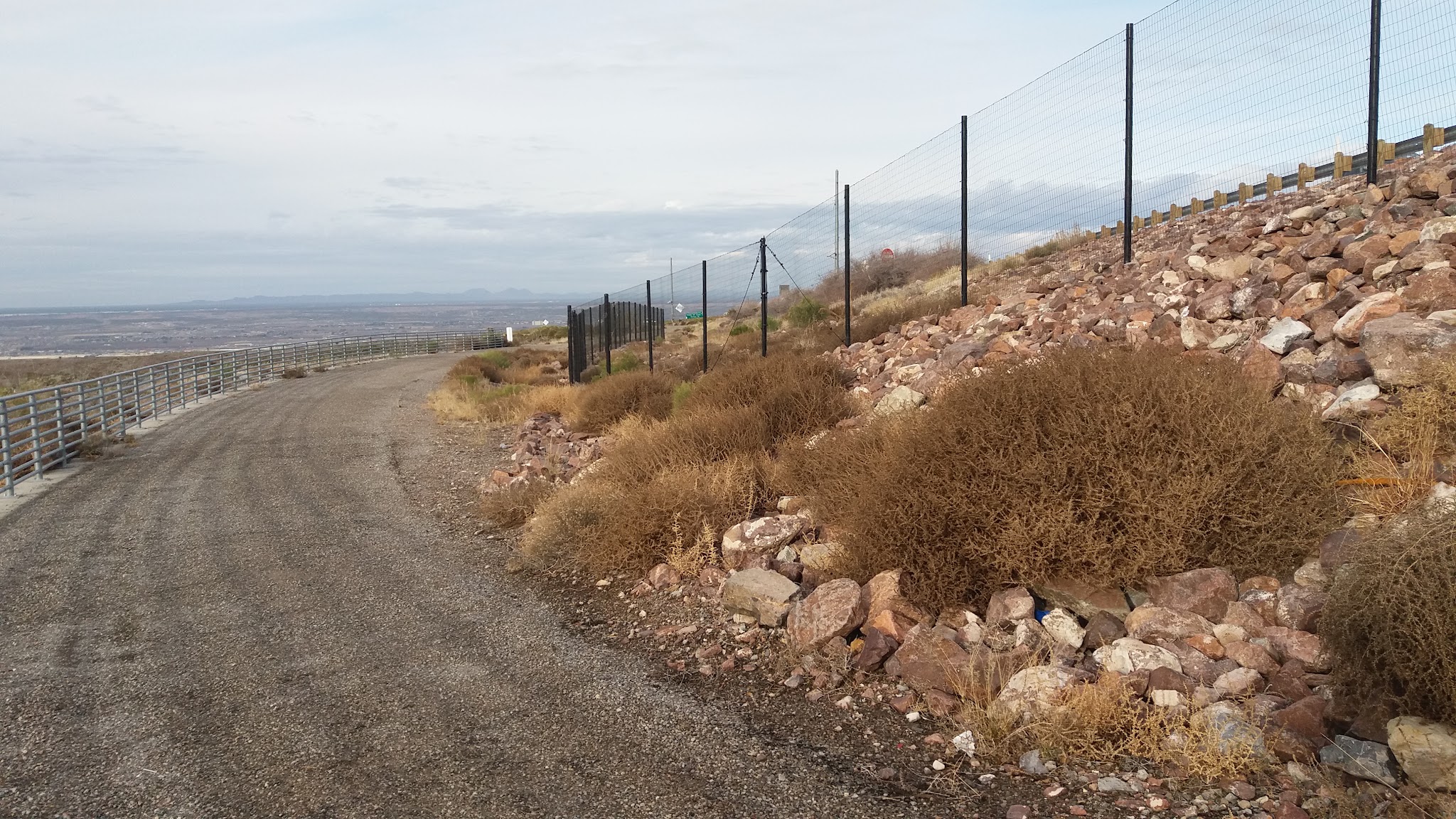 Bicycle climb Smugglers Pass West - Transmountain Drive - gravel path
