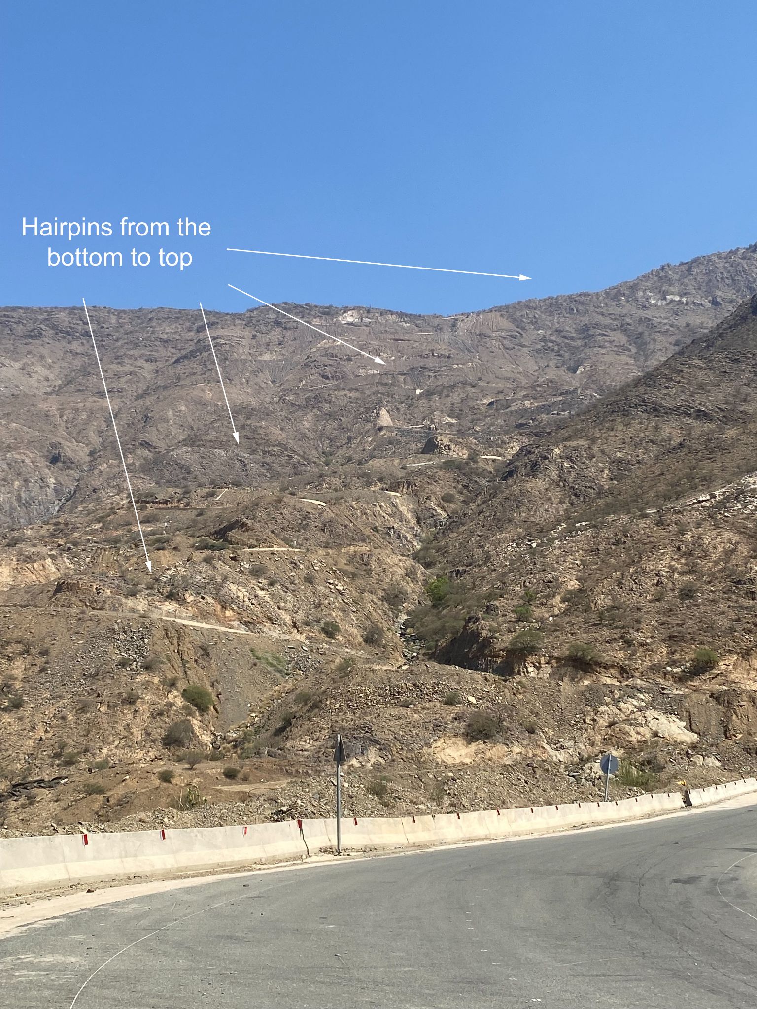 Cycling Beth-rah Pass, Asir Mountains, Saudi Arabia - view from roadway up the mountainside, showing the entire six miles of hairpin turns up the mountain
