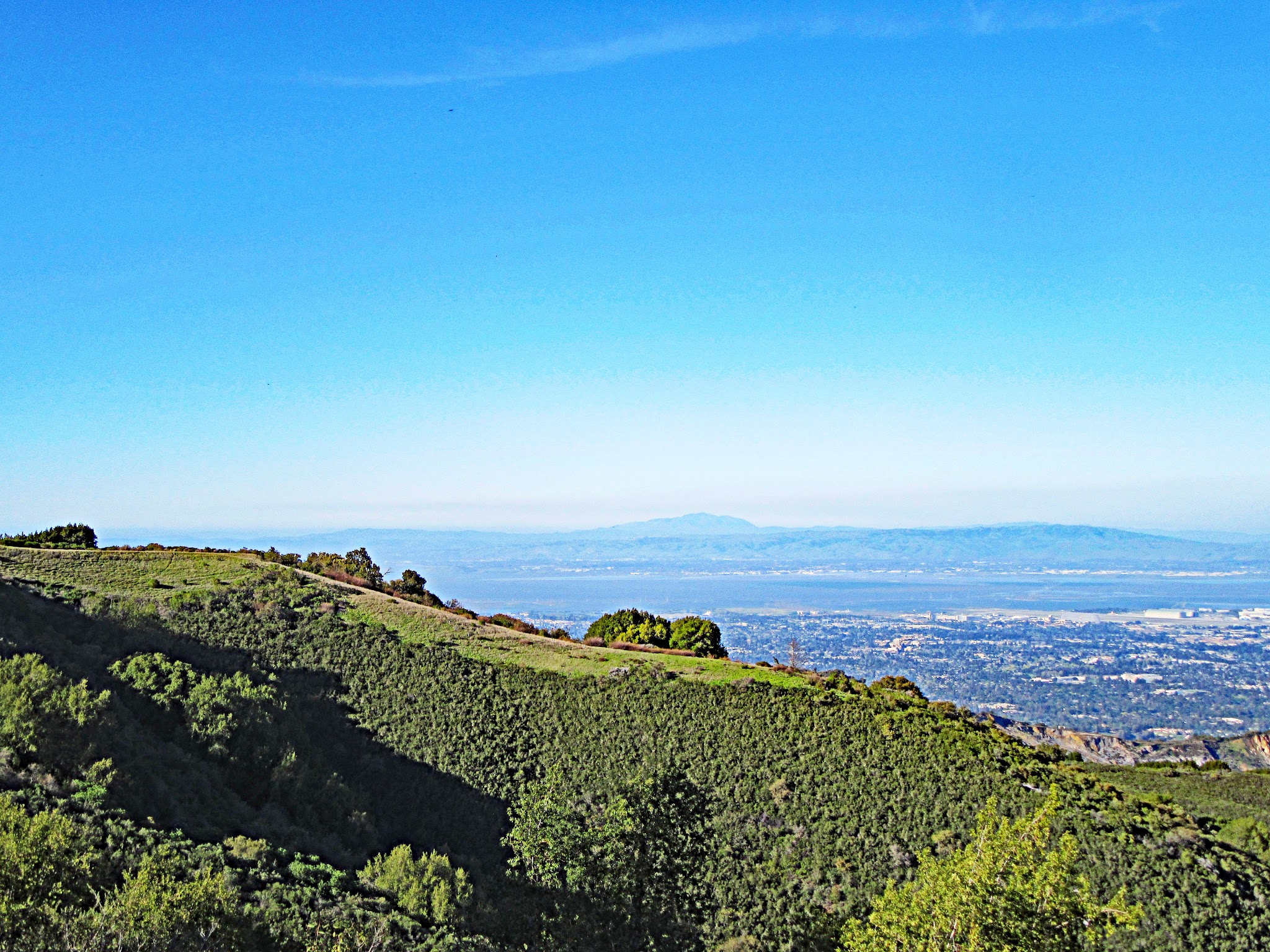 Cycling Montebello, Santa Cruz Mountains, California - view along hillside overlooking Mt. Diablo