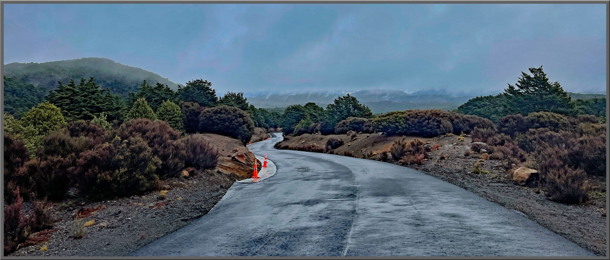 wet, one-lane country road