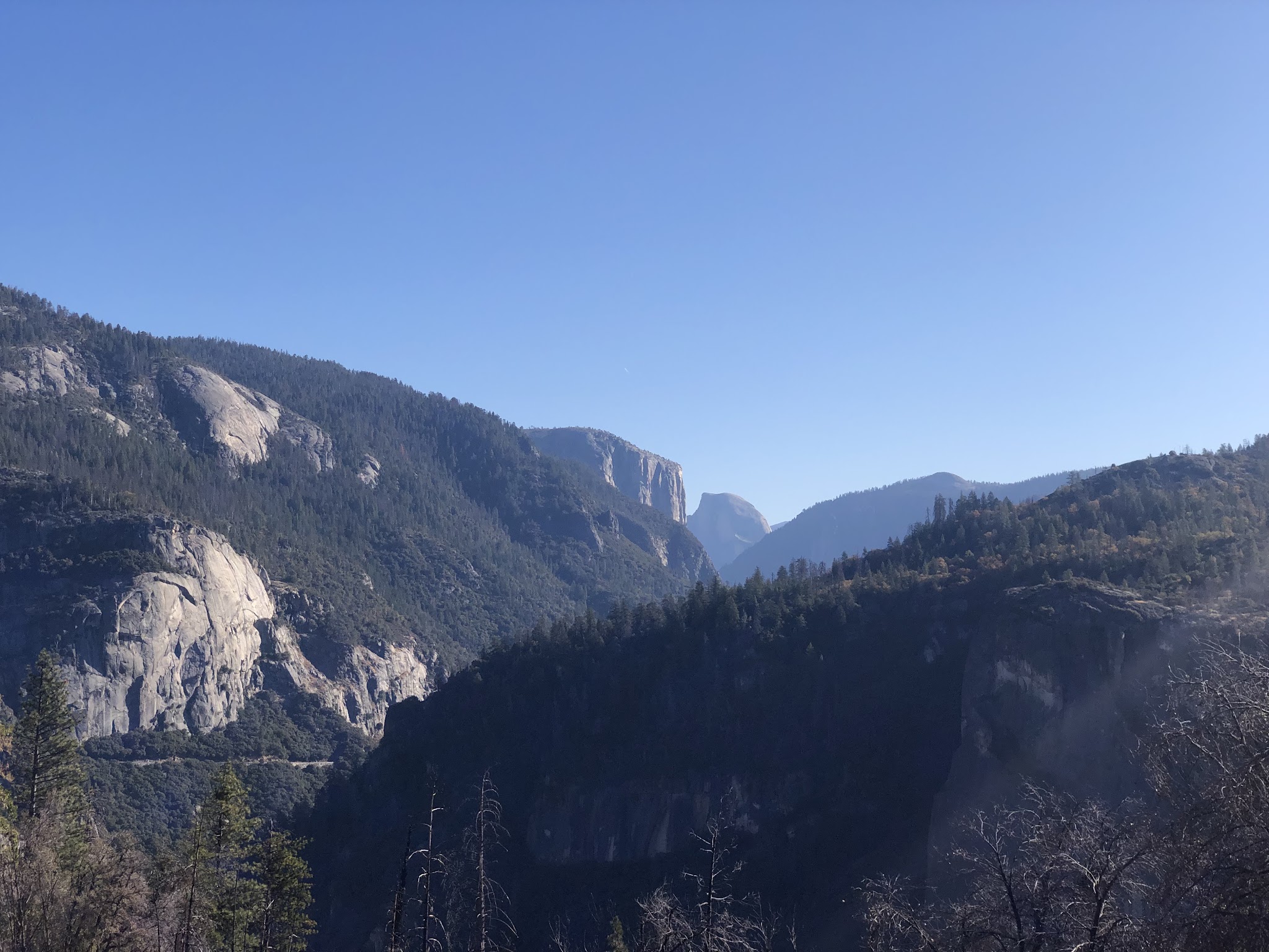 El Capitan and Half Dome as seen on the way down towards Yosemite Valley