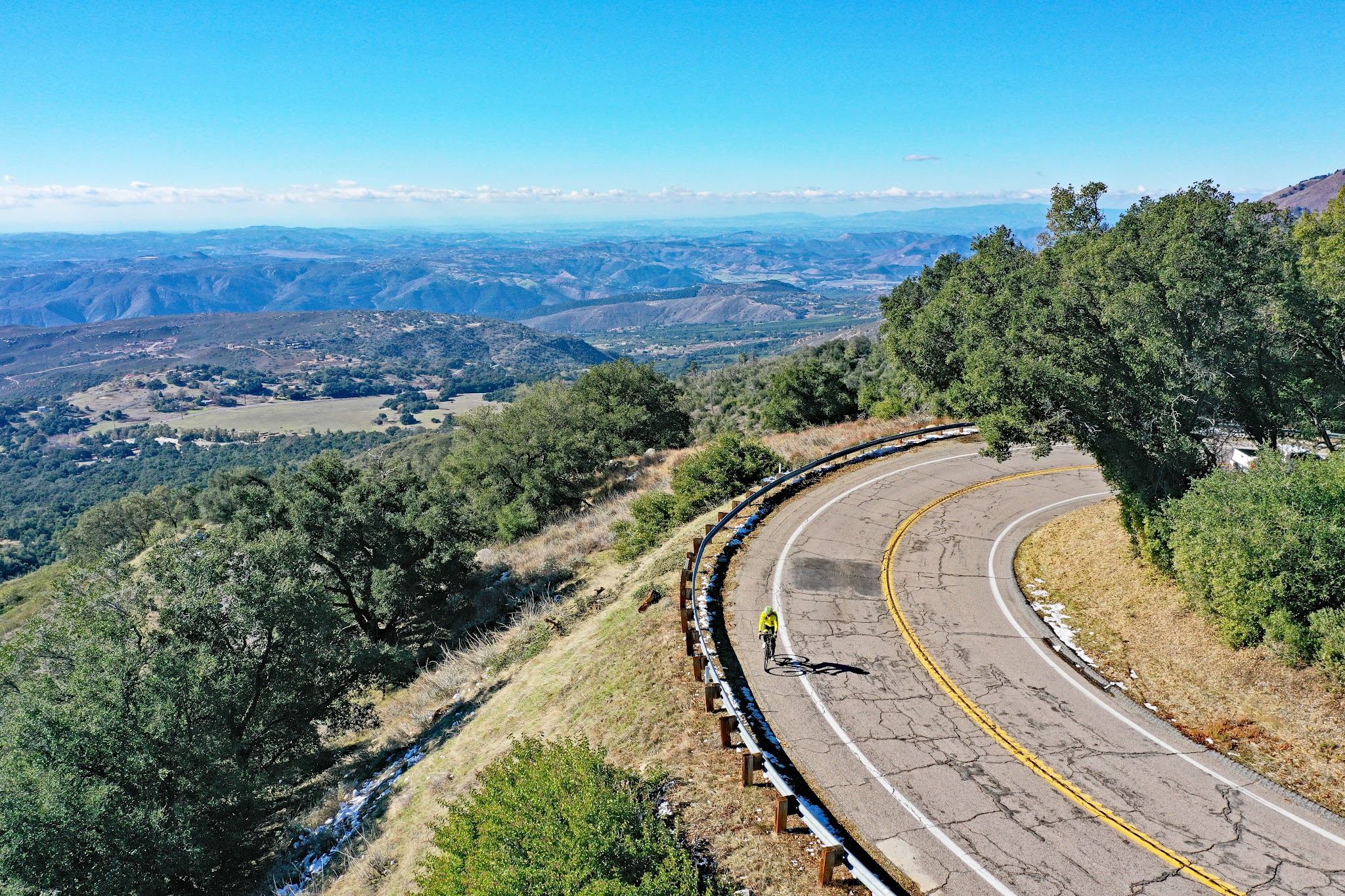 Cycling Palomar Mountain - cyclist on bike south grade road