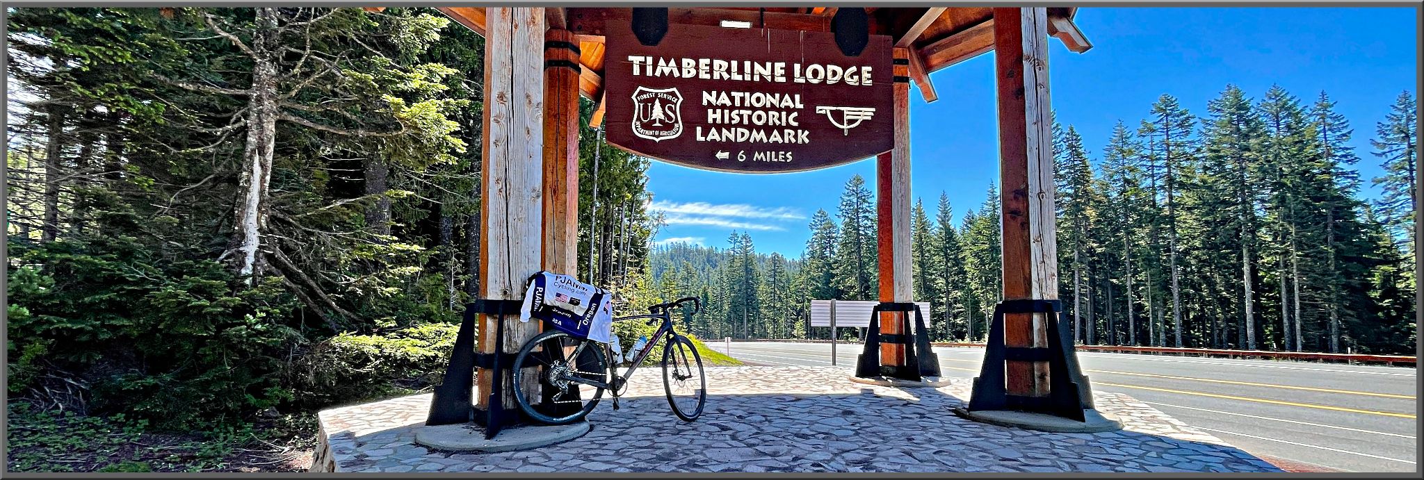 Bike Parked in front of sign for "Timberline Lodge, National Historic Landmark"
