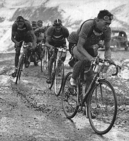 Cycling Col de la Croix de Fer, Saint-Jean-de-Maurienne - the iron cross, sky and mountain