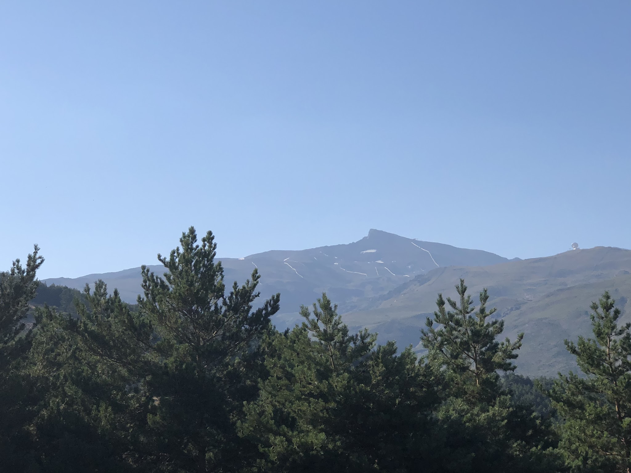 The peak of Pico de Veleta, Sierra Nevada Mountains, in the distance