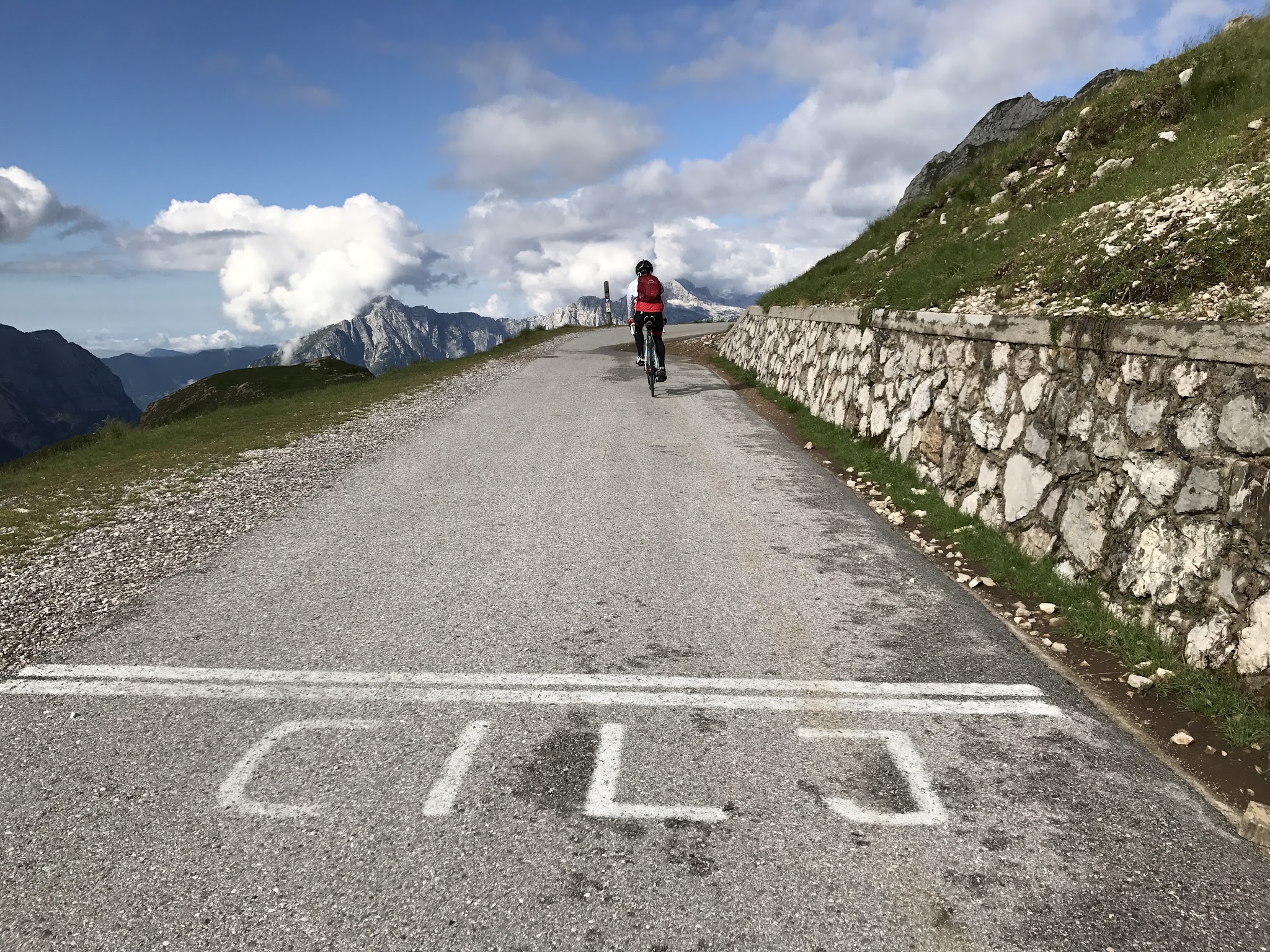 biking up Vzpon na Mangart - cyclist on roadway