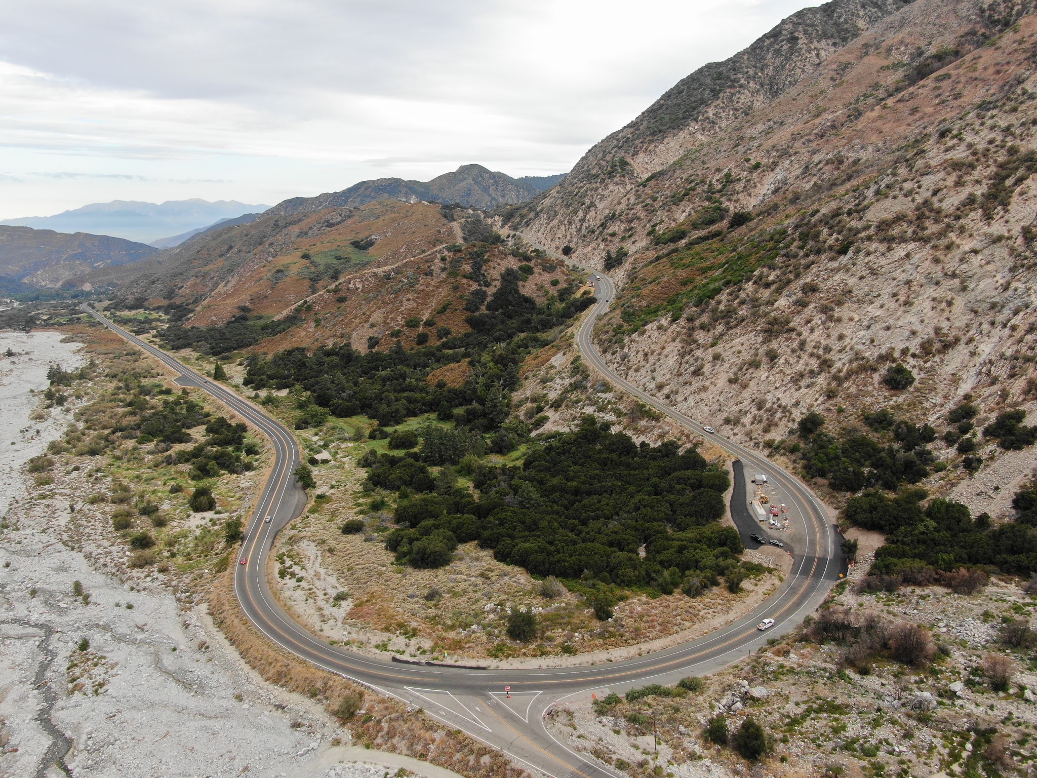 aerial drone view shows hairpin turn at the Valley of Falls exit