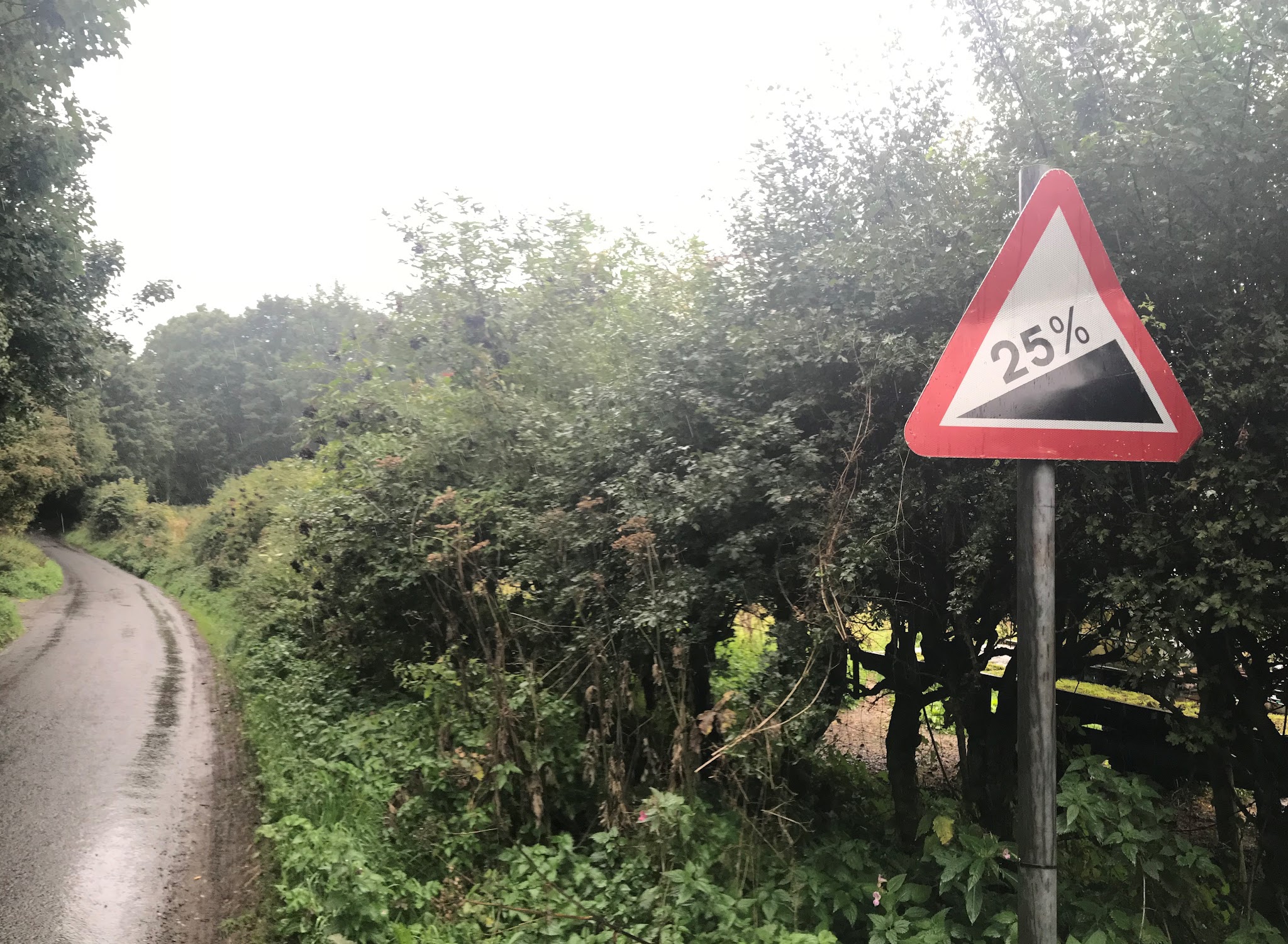 Bike climb White Horse Bank - #56 Simon Warren 100 Greatest Cycling Climbs  - 25% grade sign, roadway