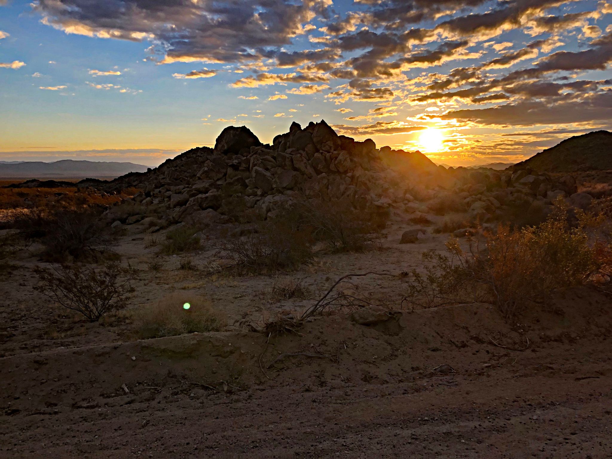 Cycling Joshua Tree National Park, California - desert rock landscape at sunset