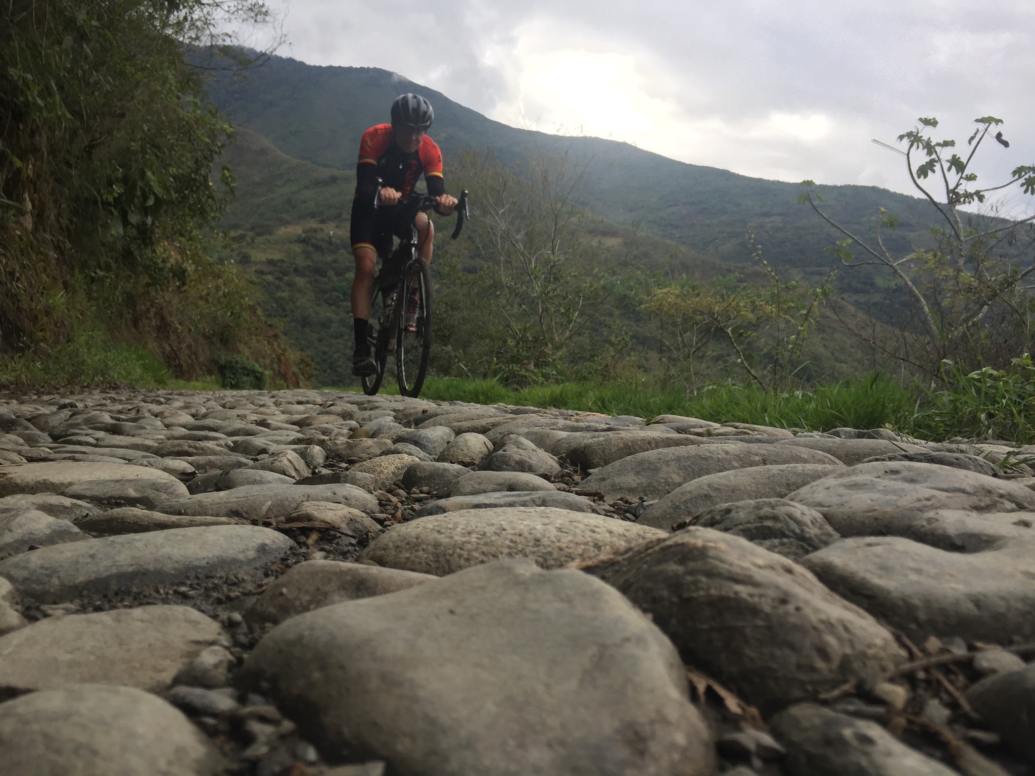 Road Rocks Bicyclist riding over giant cobbles on North Yungas Road