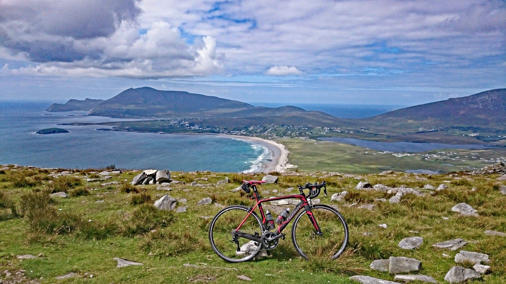 view looking out over Keel Strand from climb summit