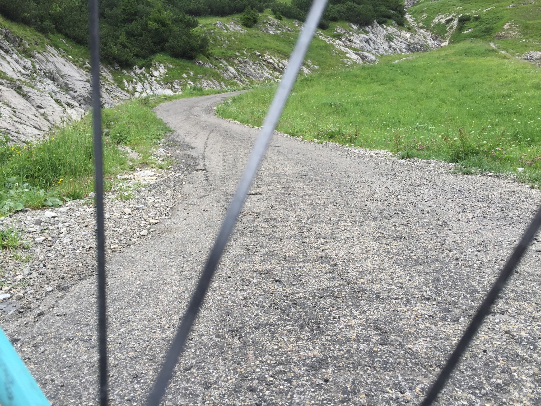 Cycling Nebelhorn  - steep roadway through wheel spokes