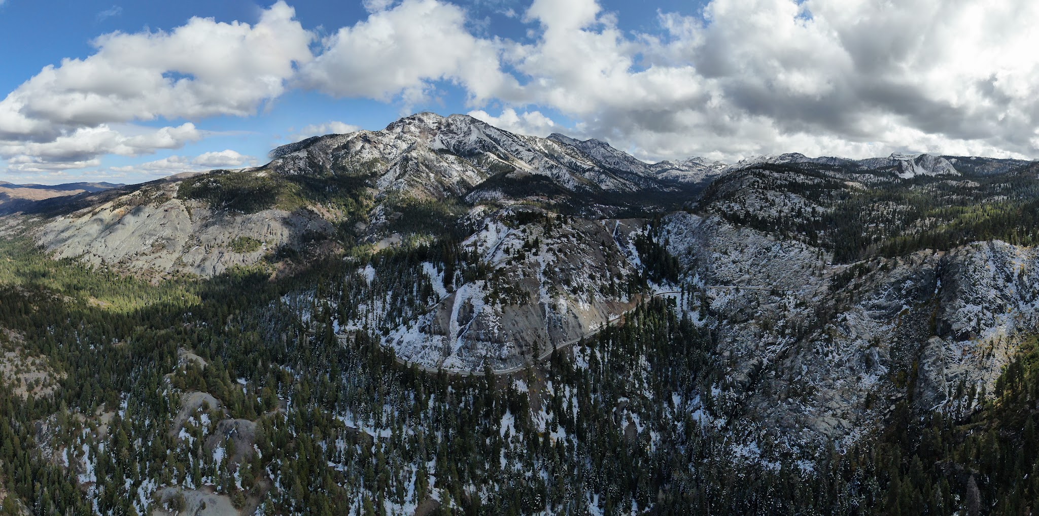 Cycling Ebbetts Pass - aerial drone video of the mountain and snow
