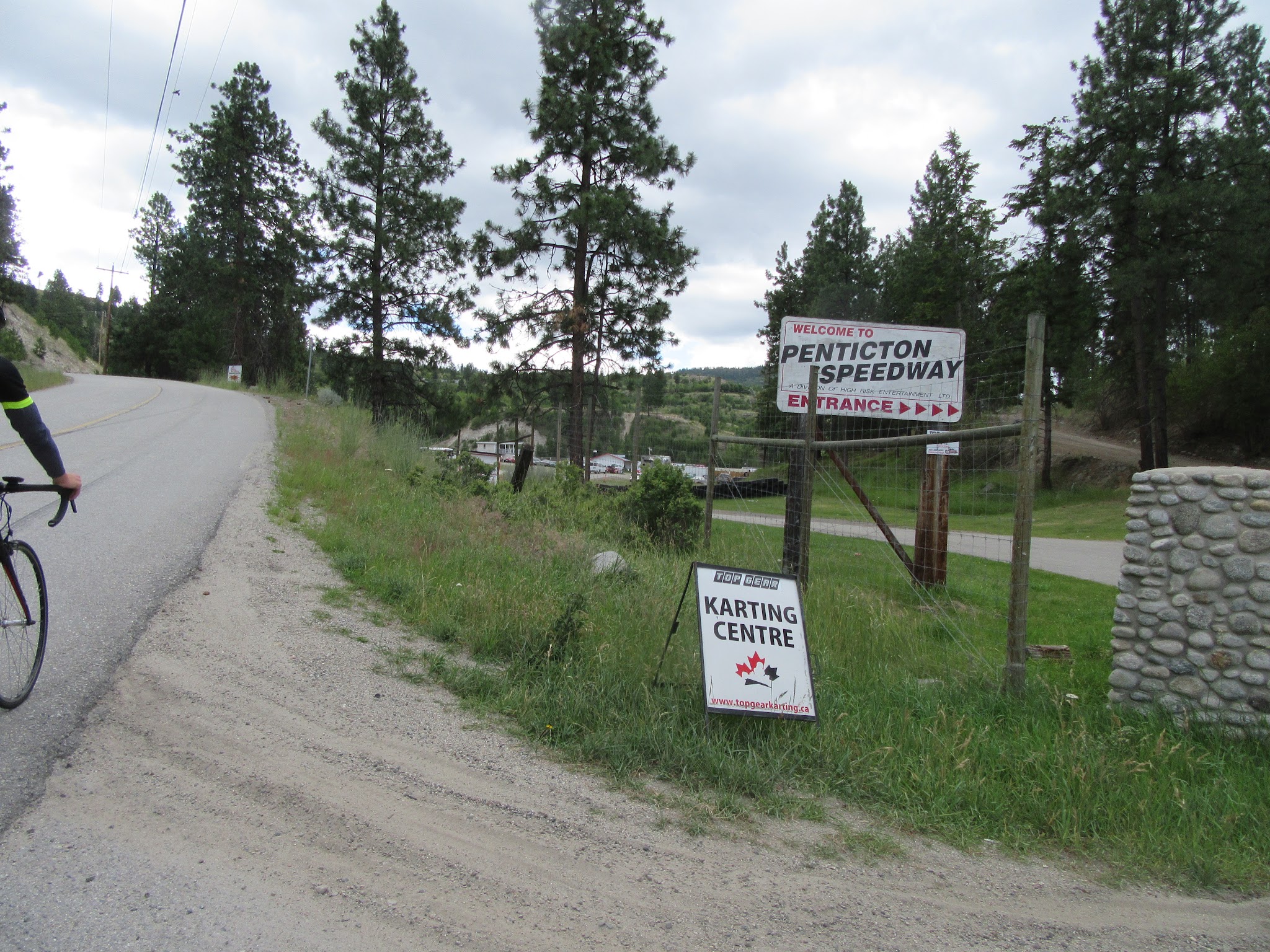 Carmin Avenue Climbing Carmi Avenue by bike - Penticton Speeway sign
