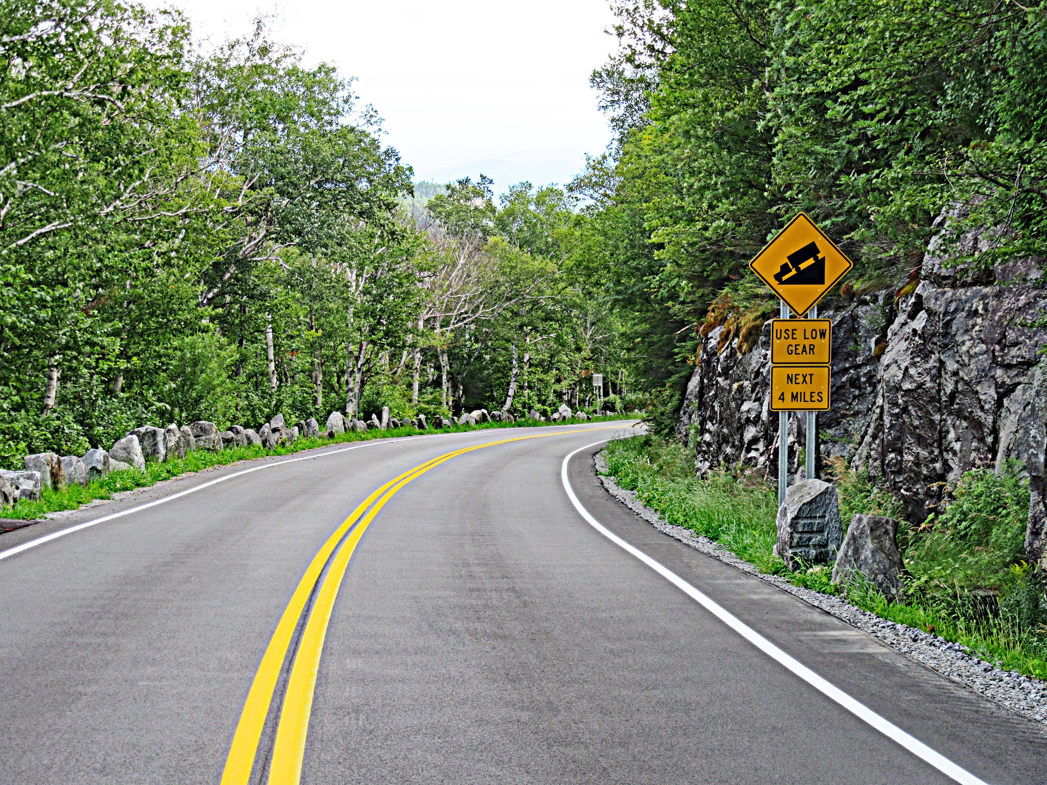 Climbing Whiteface Mountain by bike - steep grade sign.