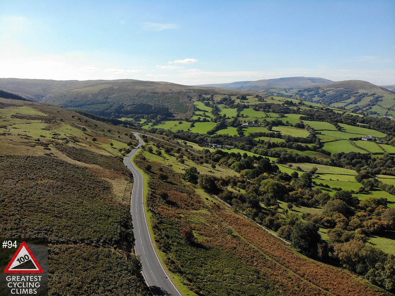 Cycling Llangynidir Mountains #94 Simon Warren 100 Greatest Cycling Climbs  - aerial drone photo - road and hills; 100 Greatest Cycling Climbs logo
