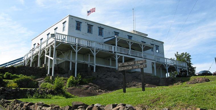Cycling Mount Holyoke, Massachusetts - large white building at Holyoke Summit, American flag flying