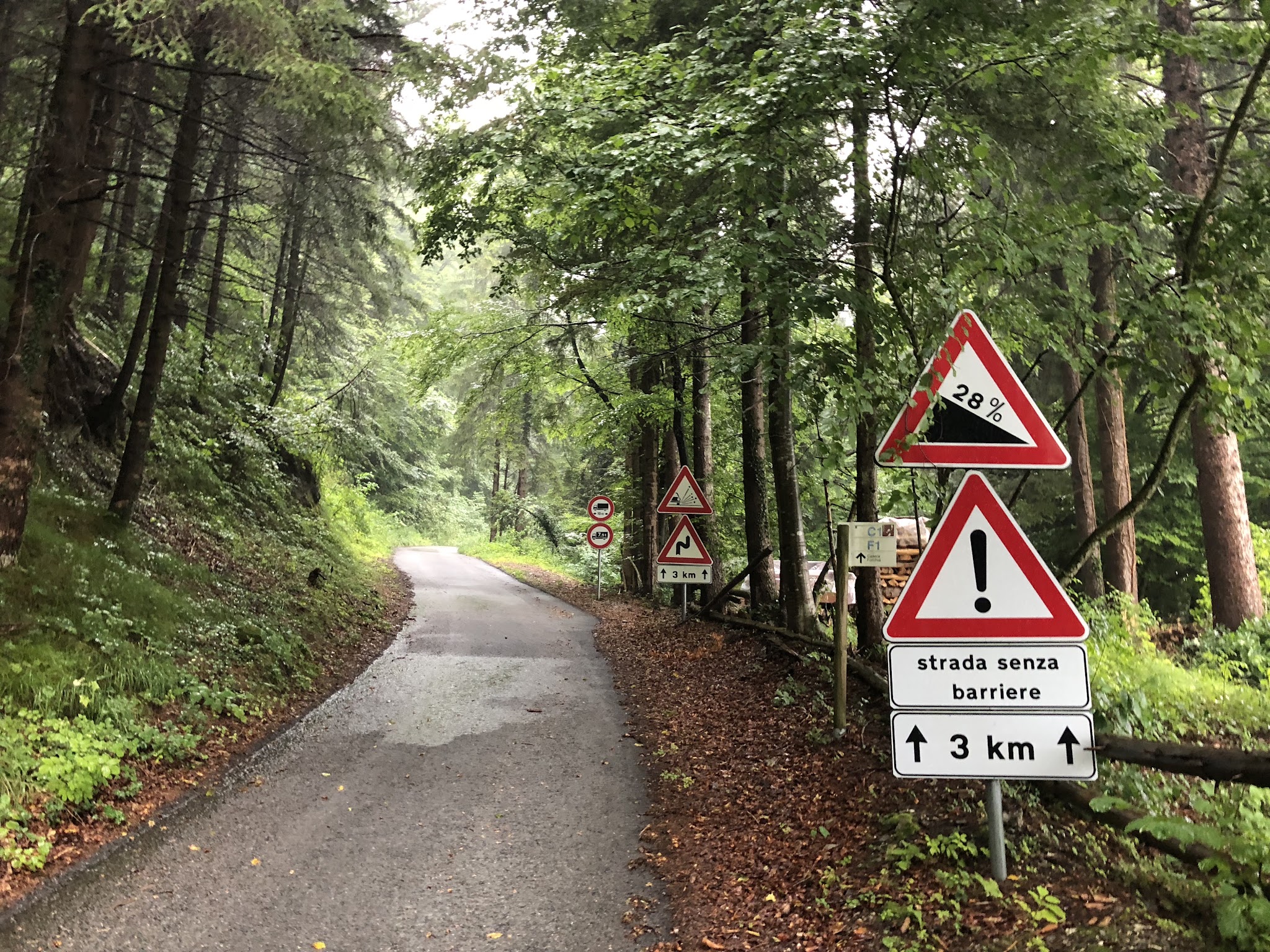 Cycling Passo della Forcella, Italy second hardest climb in Italy - road and steep grade sign