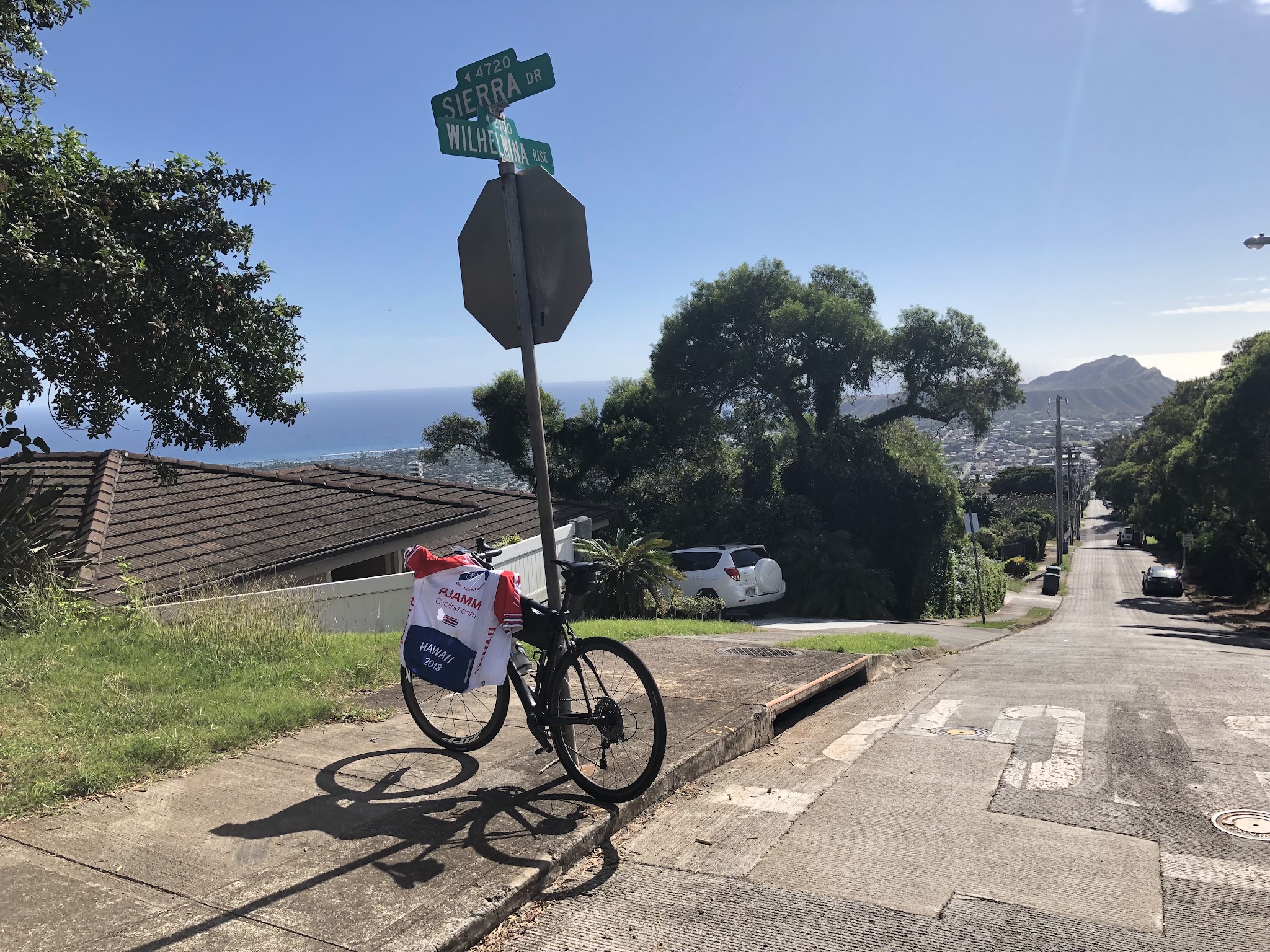 Bicycle ride up Wilhelmina Rise - bike with jersey at street sign
