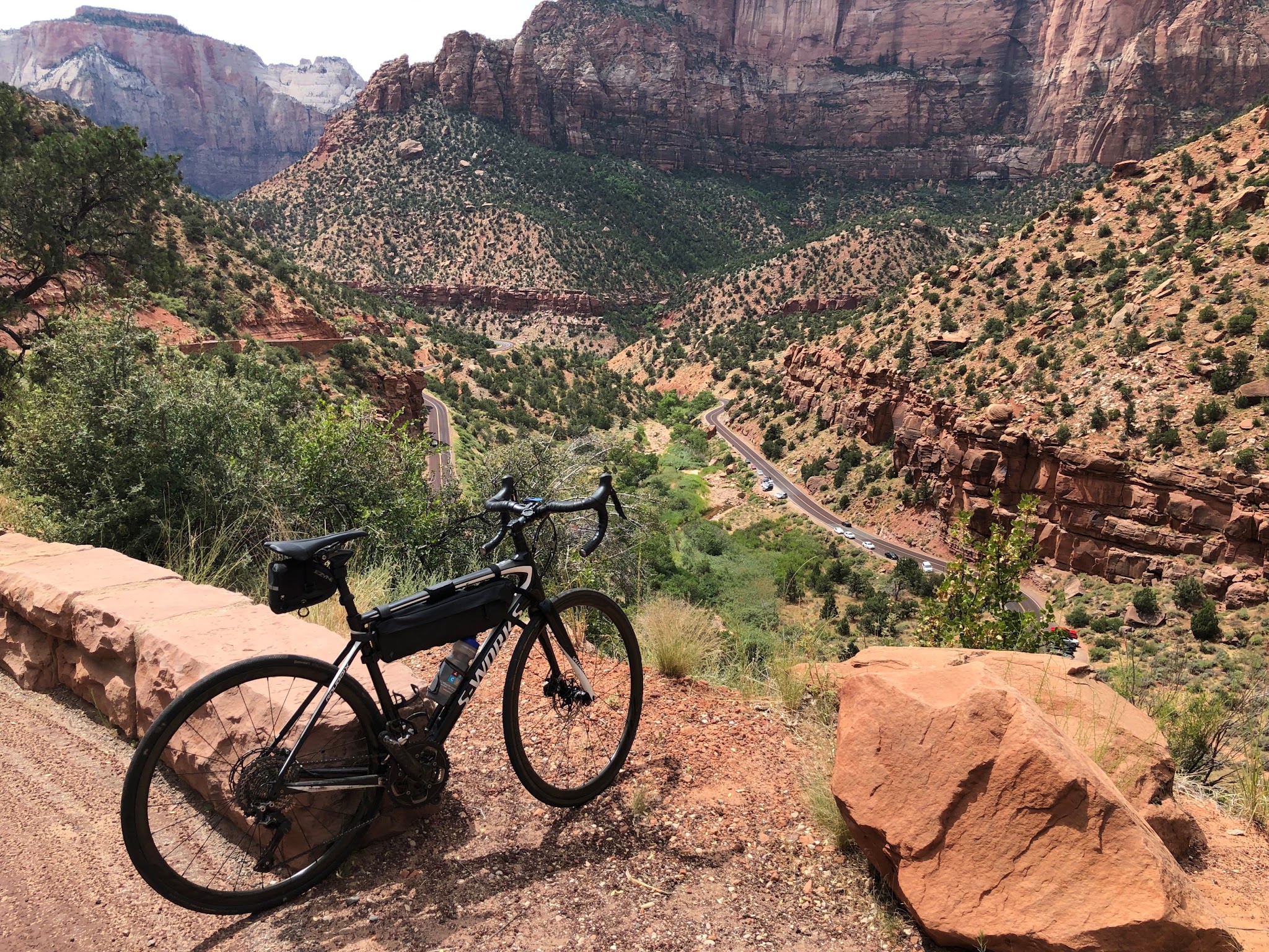 Hwy 9 to Zion Tunnel Bike climb Hwy 9 to Zion Tunnel - bicycle above roadway with rock formations in view