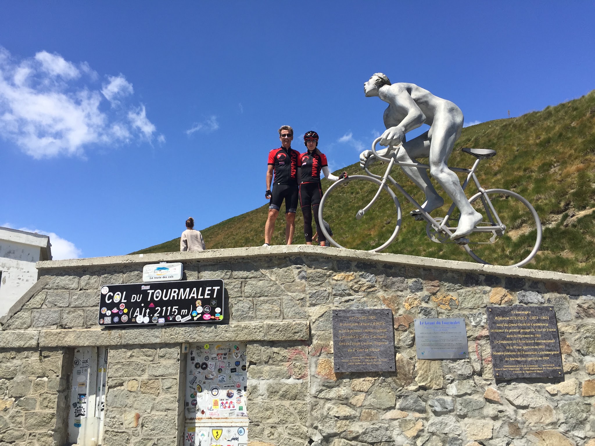 Cycling The French Pyrenees - Col du Tourmalet - Geant with cyclists on top