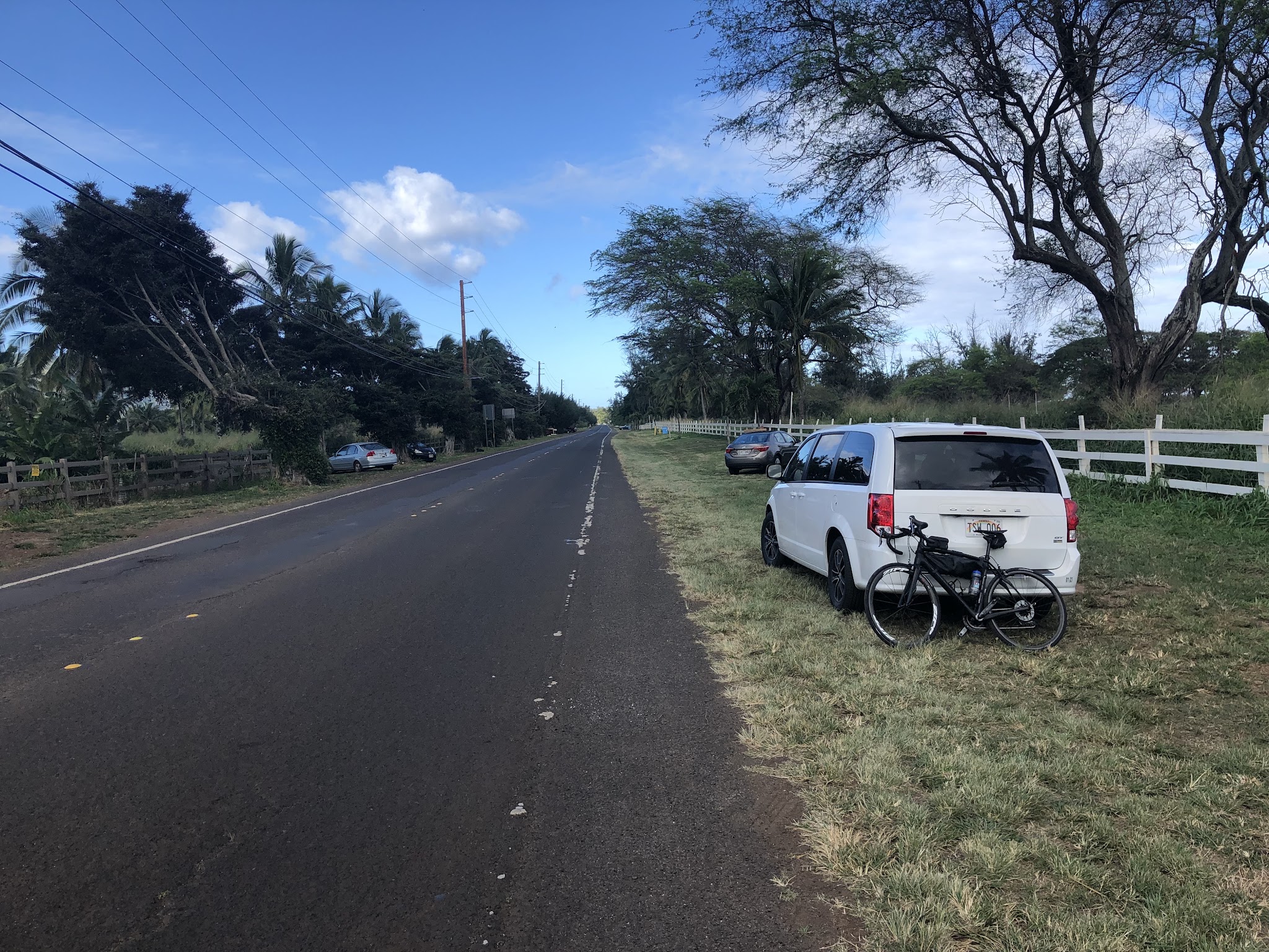 Bicycle ride up Mokuleia Forest Reserve Road - Farrington Hwy and cars parked near start. 