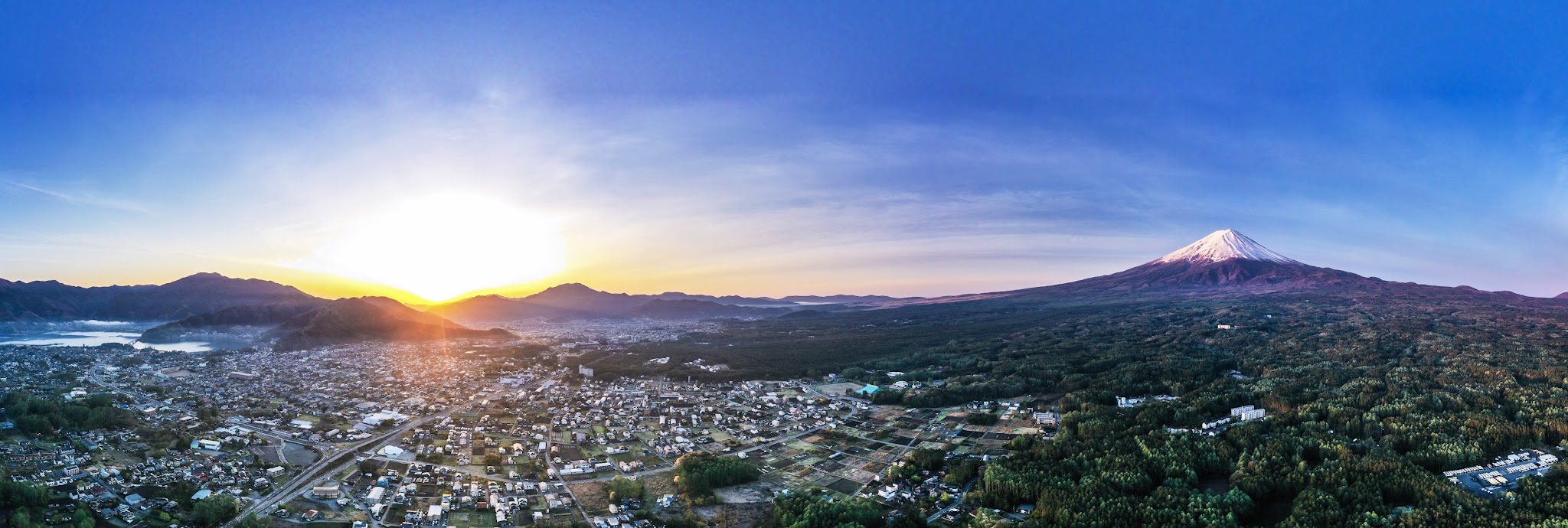 Cycling Mt. Fuji Azami Line - drone aerial sphere photo of Mt. Fuji at sunrise