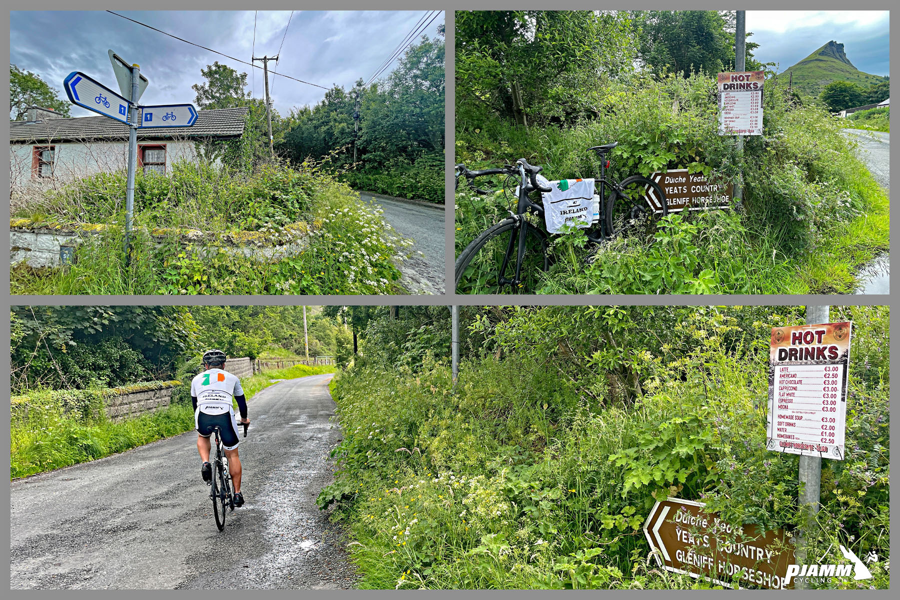 PJAMM Cyclist rides on narrow country roadway, dense greenery n roadside; sign for Hot Drinks