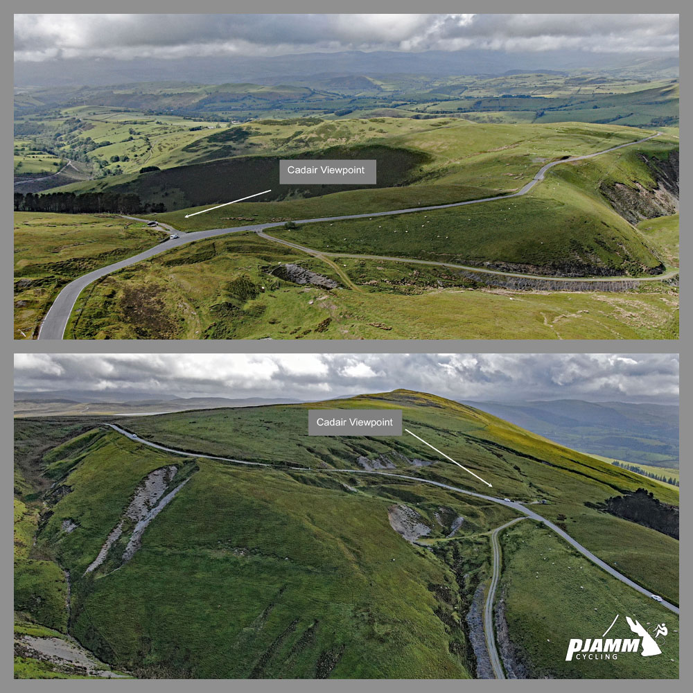 aerial drone view shows roadway stretching along green pastureland hills