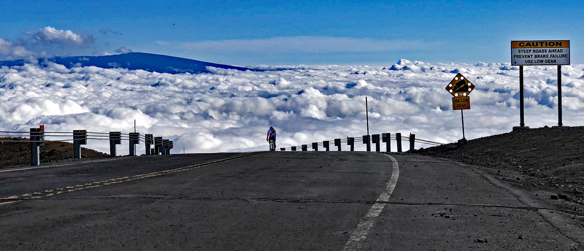 Cycling Top US Bike Climbs - road, volcano, clouds on Mauna Kea