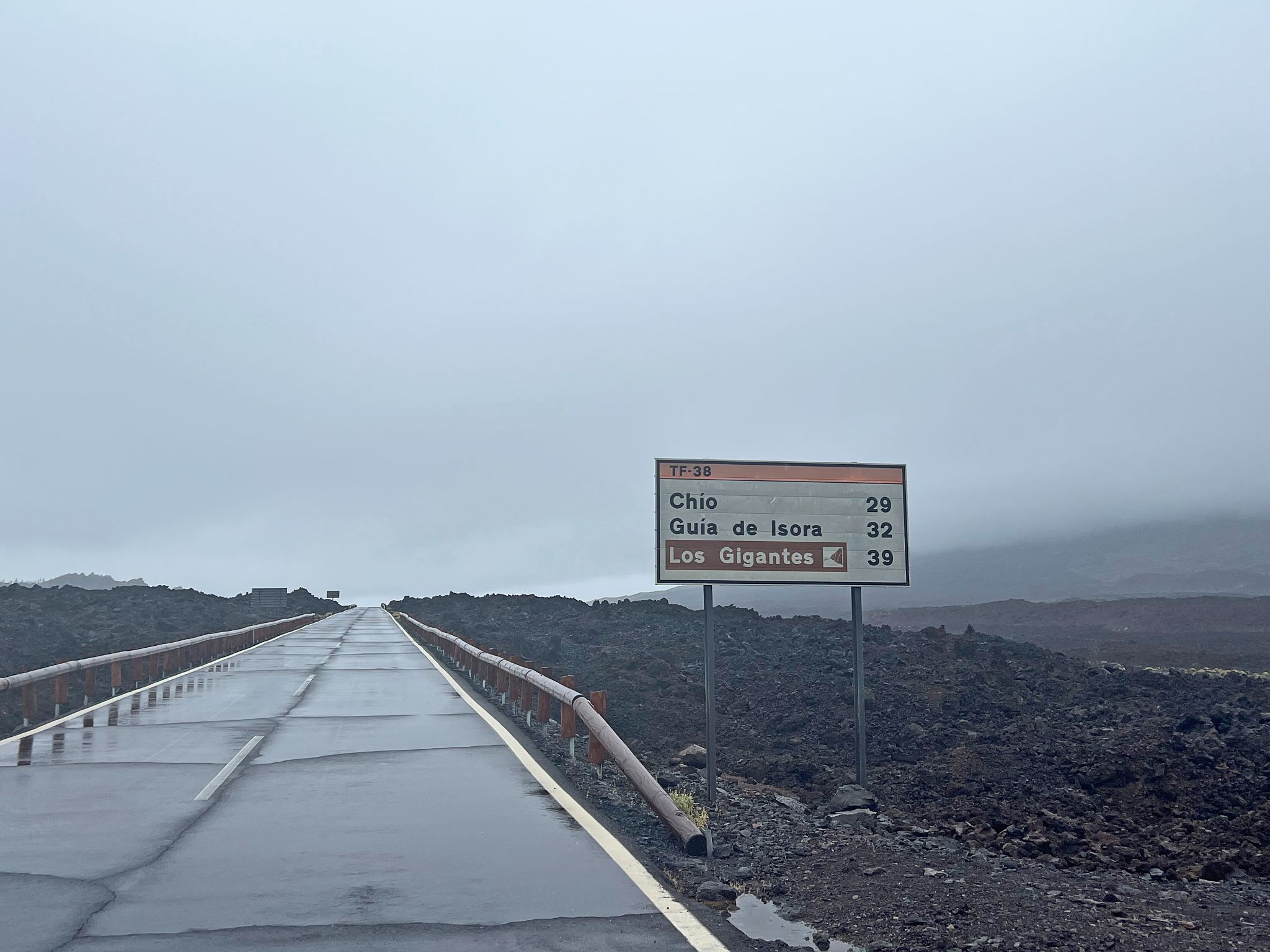road sign for Chio, Guia de Isora, and Los Gigantes