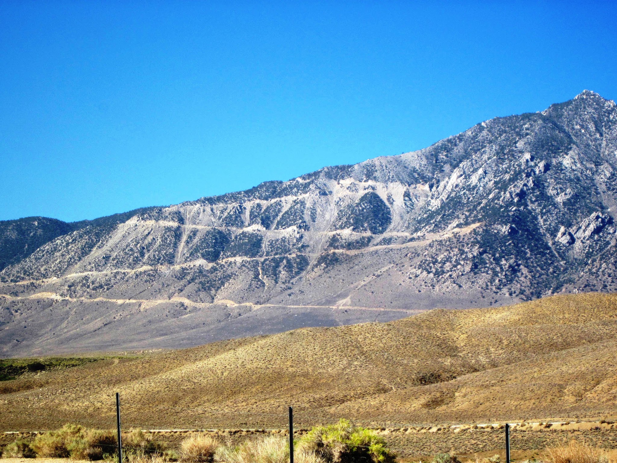 Photo taken from Highway 395 just south of Lone Pine, shows switchbacks up the mountainside on Horseshoe Meadow Road