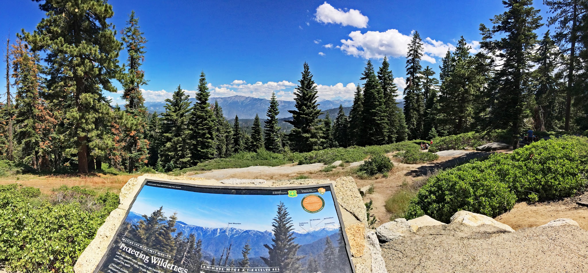 US Most Epic Bike Climbs - Whitaker Forest information sign - mountains in background