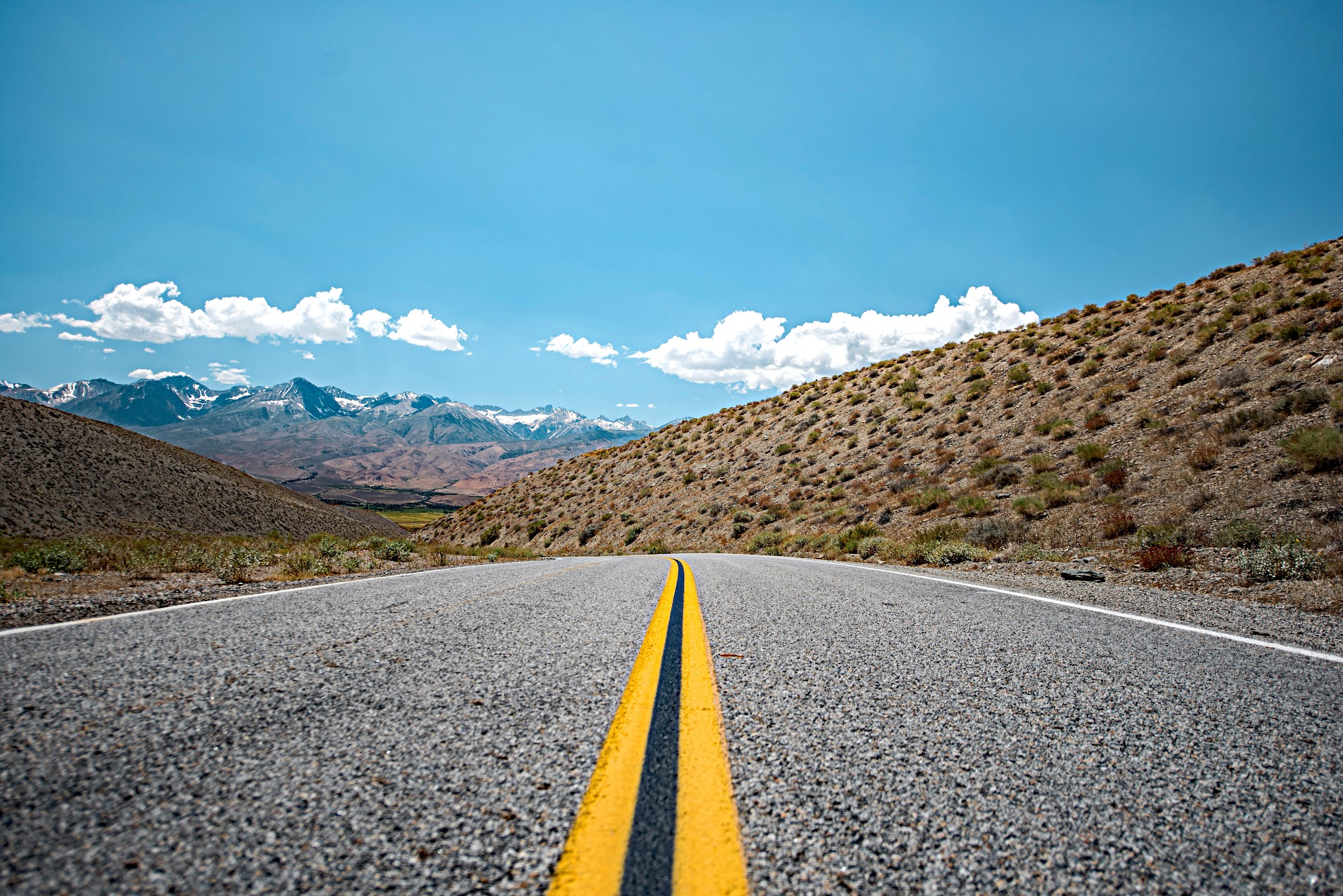 Bicycle climb of White Mountain  - roadway, center stripe, hwy 168, mountains