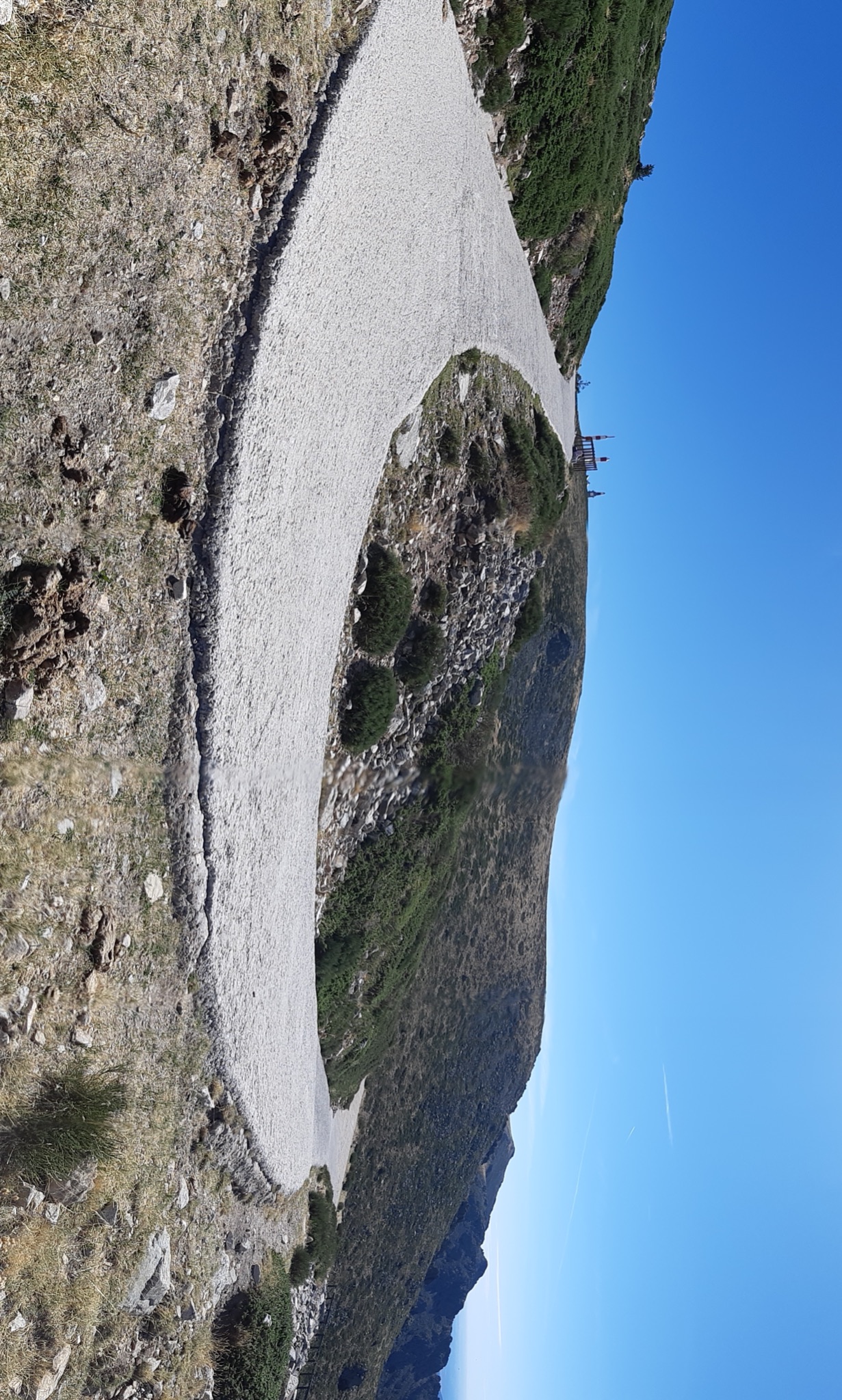 Cycling Bola del Mundo vía Puerto Navacerrada, Spain - unique u-shaped hairpin turn near the climb summit