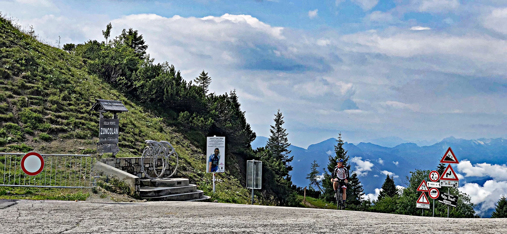 Monte Zoncolan from Ovaro bike climb - cyclist reaching the pass