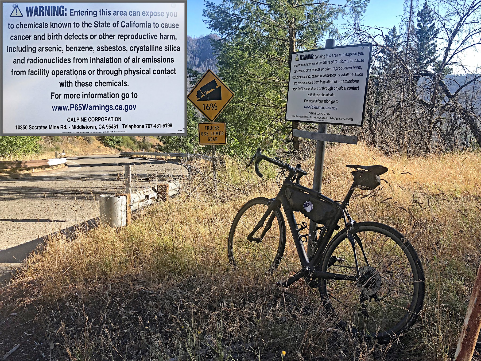 Cycling Socrates Mine Road, Lake County, California - bike parked against sign on roadside warning visitors to stay on roadside because of risk of exposure to poisonous chemicals, sign for 16% gradient on roadway