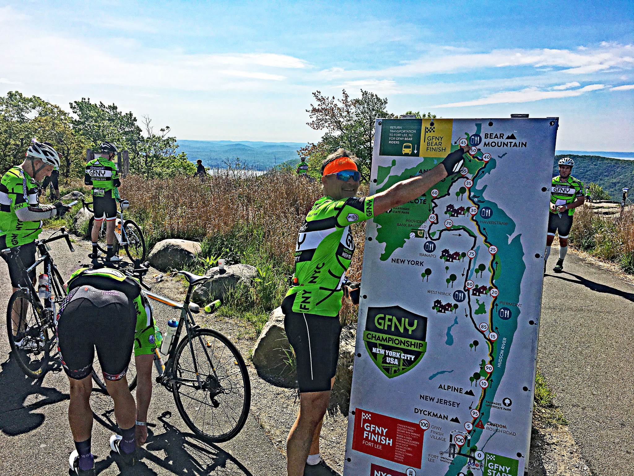 Bike climb Bear Mountain - gran fondo ny; cyclist pointing at map