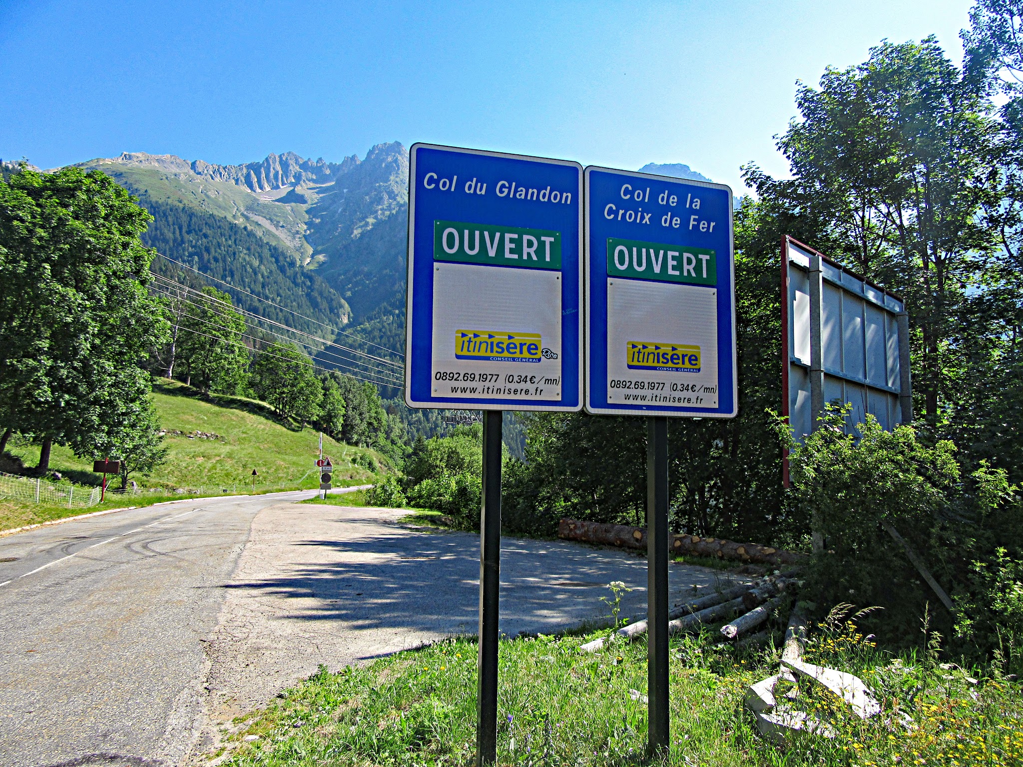 Cycling Col du Glandon, France - road signs for Col du Glandon and Col de la Croix de Fer